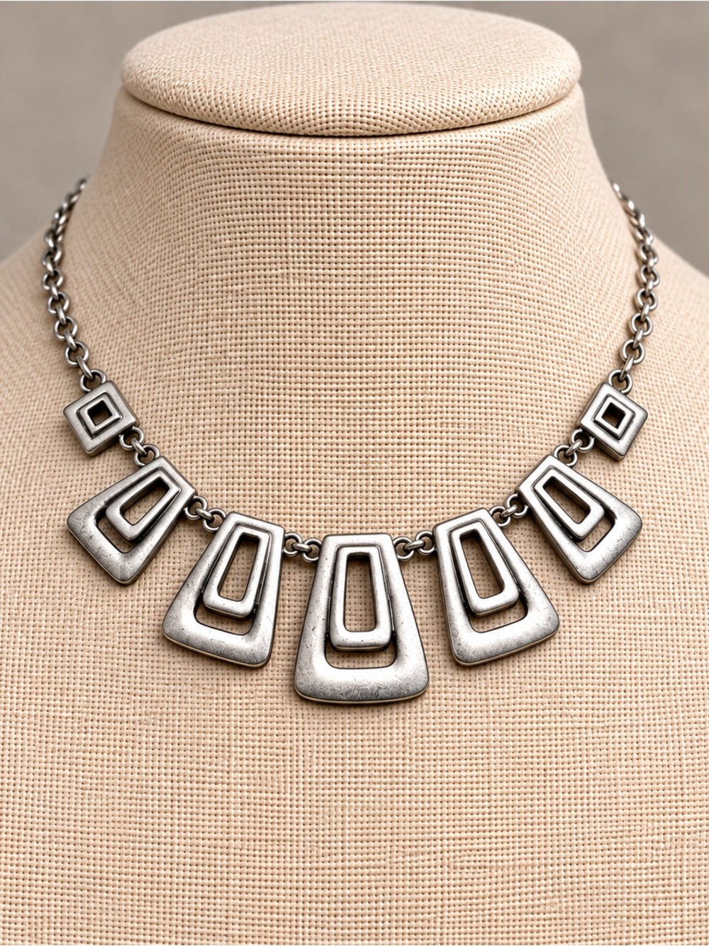 Title: Silver Tone Geometric Statement Necklace – Modern Layered Design